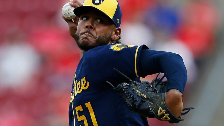 Milwaukee Brewers starting pitcher Freddy Peralta (51) throws a pitch in the first inning of the MLB National League game between the Cincinnati Reds and the Milwaukee Brewers at Great American Ball Park in downtown Cincinnati on Tuesday, May 10, 2022. The Reds led 1-0 after three innings.

Milwaukee Brewers At Cincinnati Reds