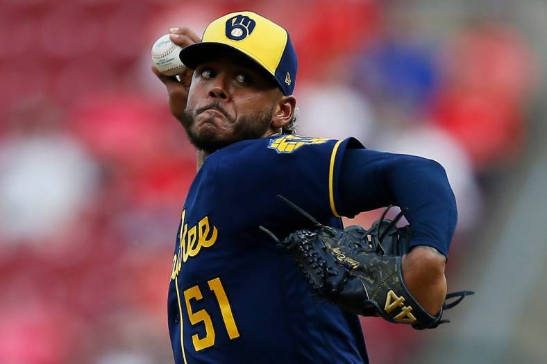 Milwaukee Brewers starting pitcher Freddy Peralta (51) throws a pitch in the first inning of the MLB National League game between the Cincinnati Reds and the Milwaukee Brewers at Great American Ball Park in downtown Cincinnati on Tuesday, May 10, 2022. The Reds led 1-0 after three innings.

Milwaukee Brewers At Cincinnati Reds