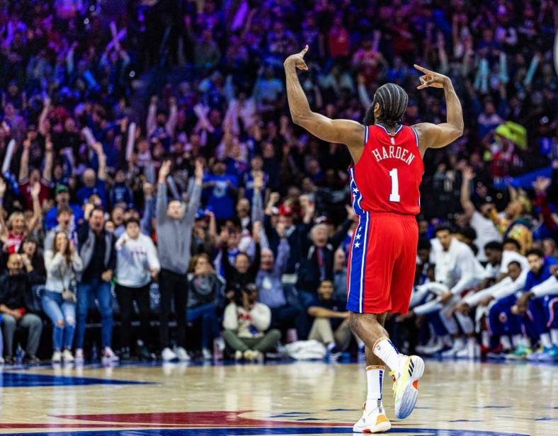 May 8, 2022; Philadelphia, Pennsylvania, USA; Philadelphia 76ers guard James Harden (1) reacts to his three pointer against the Miami Heat during the fourth quarter in game four of the second round for the 2022 NBA playoffs at Wells Fargo Center. Mandatory Credit: Bill Streicher-USA TODAY Sports