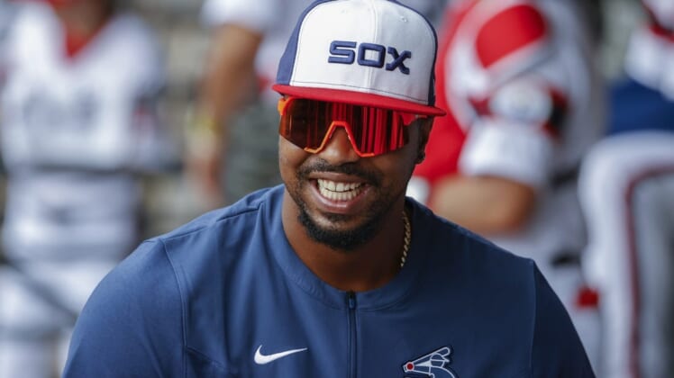 May 15, 2022; Chicago, Illinois, USA; Injured Chicago White Sox left fielder Eloy Jimenez smiles before a baseball game against the New York Yankees at Guaranteed Rate Field. Mandatory Credit: Kamil Krzaczynski-USA TODAY Sports