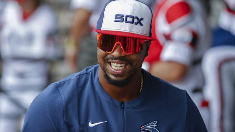 May 15, 2022; Chicago, Illinois, USA; Injured Chicago White Sox left fielder Eloy Jimenez smiles before a baseball game against the New York Yankees at Guaranteed Rate Field. Mandatory Credit: Kamil Krzaczynski-USA TODAY Sports