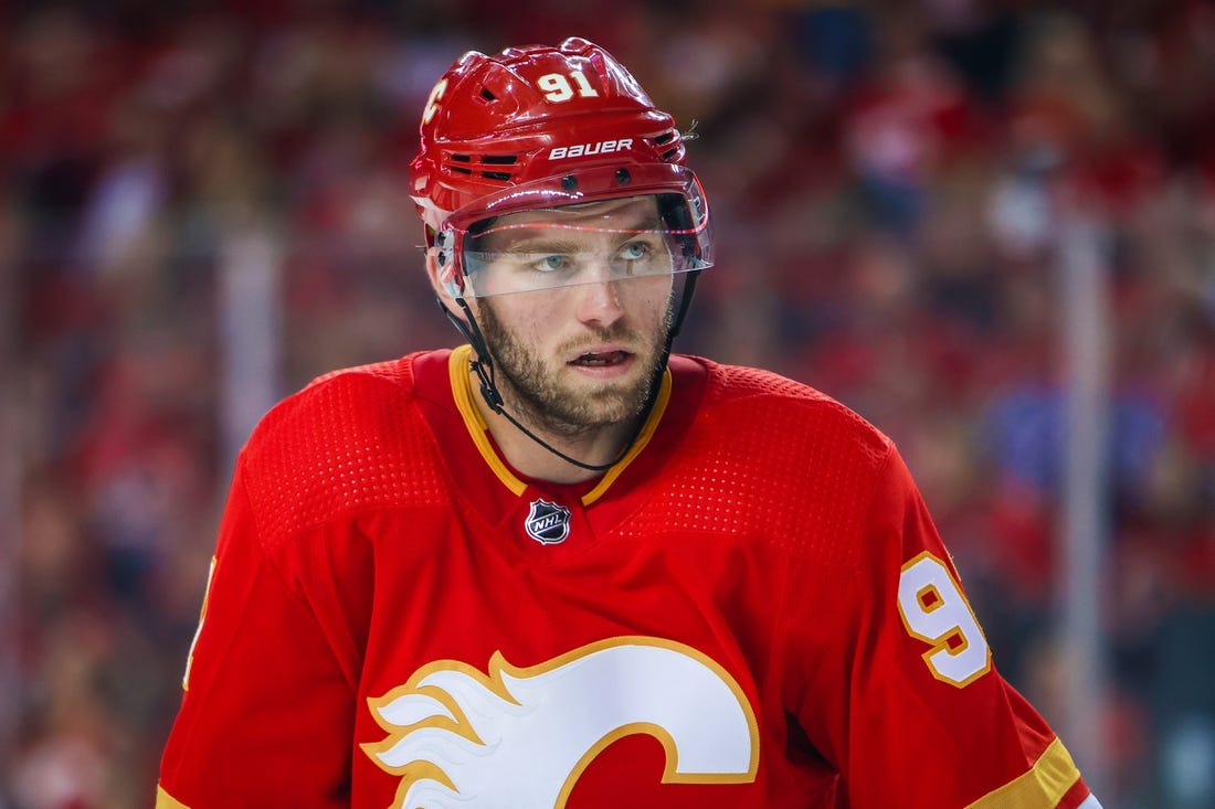 May 15, 2022; Calgary, Alberta, CAN; Calgary Flames center Calle Jarnkrok (91) during the face off against the Dallas Stars during the third period in game seven of the first round of the 2022 Stanley Cup Playoffs at Scotiabank Saddledome. Mandatory Credit: Sergei Belski-USA TODAY Sports