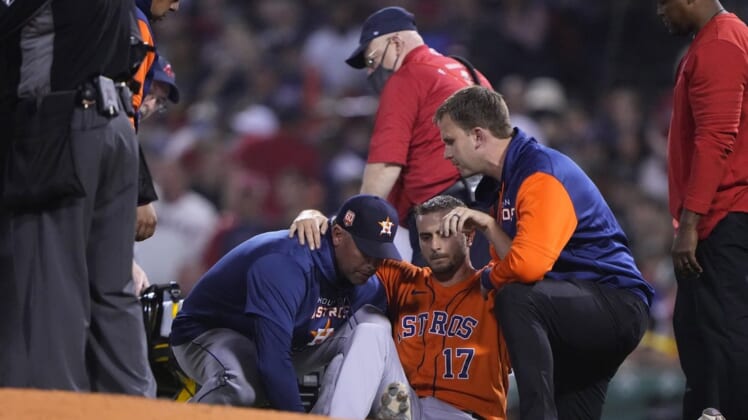 May 16, 2022; Boston, Massachusetts, USA; Houston Astros pitcher Jake Odorizzi (17) is helped onto a stretcher after suffering a leg injury during the fifth inning against the Boston Red Sox at Fenway Park. Mandatory Credit: Gregory Fisher-USA TODAY Sports