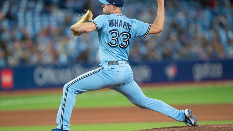 May 16, 2022; Toronto, Ontario, CAN; Toronto Blue Jays relief pitcher Trevor Richards (33) throws a pitch against the Seattle Mariners during the seventh inning at Rogers Centre. Mandatory Credit: Nick Turchiaro-USA TODAY Sports