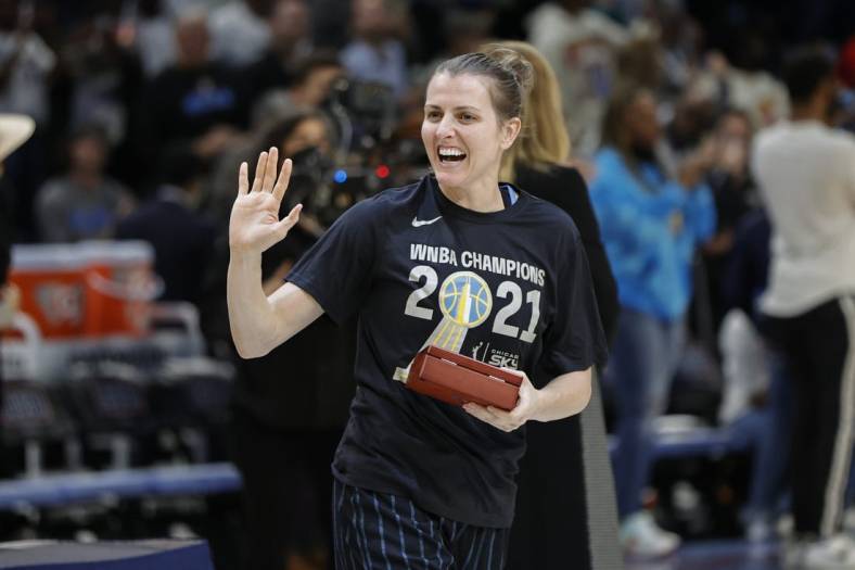 May 24, 2022; Chicago, Illinois, USA; Chicago Sky guard Allie Quigley smiles after receiving a championship during a championship ring ceremony for the Chicago Sky before a WNBA basketball game against the Indiana Fever at Wintrust Arena. Mandatory Credit: Kamil Krzaczynski-USA TODAY Sports