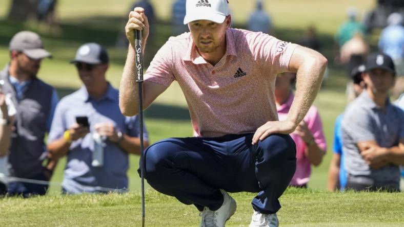 May 26, 2022; Fort Worth, Texas, USA; Daniel Berger lines up a putt on the tenth green during the first round of the Charles Schwab Challenge golf tournament. Mandatory Credit: Jim Cowsert-USA TODAY Sports