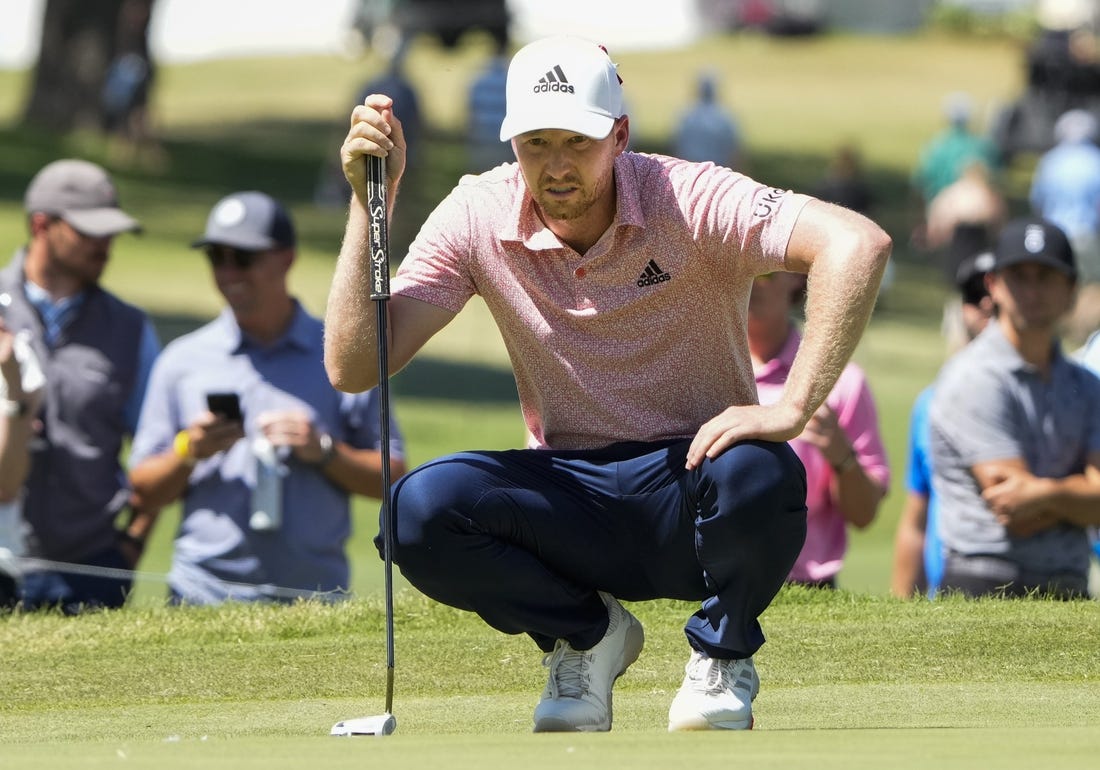 May 26, 2022; Fort Worth, Texas, USA; Daniel Berger lines up a putt on the tenth green during the first round of the Charles Schwab Challenge golf tournament. Mandatory Credit: Jim Cowsert-USA TODAY Sports