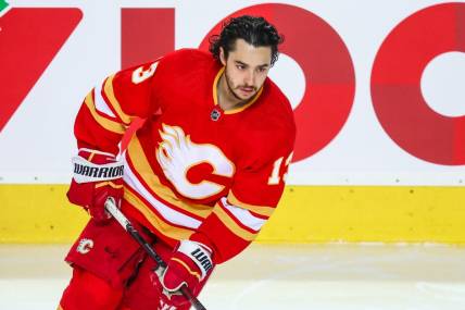 May 26, 2022; Calgary, Alberta, CAN; Calgary Flames left wing Johnny Gaudreau (13) skates during the warmup period against the Edmonton Oilers in game five of the second round of the 2022 Stanley Cup Playoffs at Scotiabank Saddledome. Mandatory Credit: Sergei Belski-USA TODAY Sports