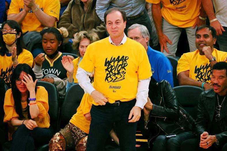 May 26, 2022; San Francisco, California, USA; Joe Lacob, co-executive chairman and CEO of the Golden State Warriors, watches his team play against the Dallas Mavericks during the second half of game five of the 2022 western conference finals at Chase Center. Mandatory Credit: Kelley L Cox-USA TODAY Sports