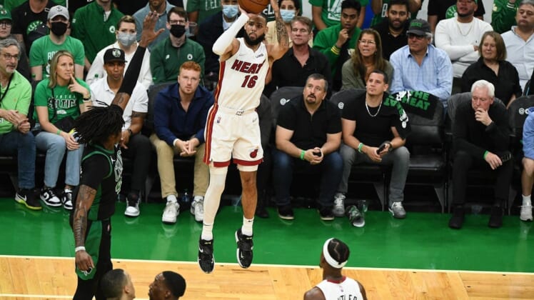 May 27, 2022; Boston, Massachusetts, USA; Miami Heat forward Caleb Martin (16) shoots against the Boston Celtics during the first half in game six of the 2022 eastern conference finals at TD Garden. Mandatory Credit: Brian Fluharty-USA TODAY Sports