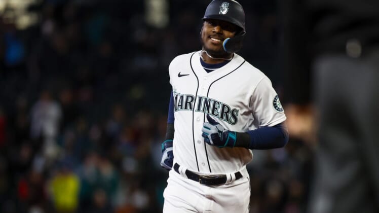 May 28, 2022; Seattle, Washington, USA; Seattle Mariners designated hitter Kyle Lewis (1) runs the bases after hitting a solo home run against the Houston Astros during the second inning at T-Mobile Park. Mandatory Credit: Joe Nicholson-USA TODAY Sports
