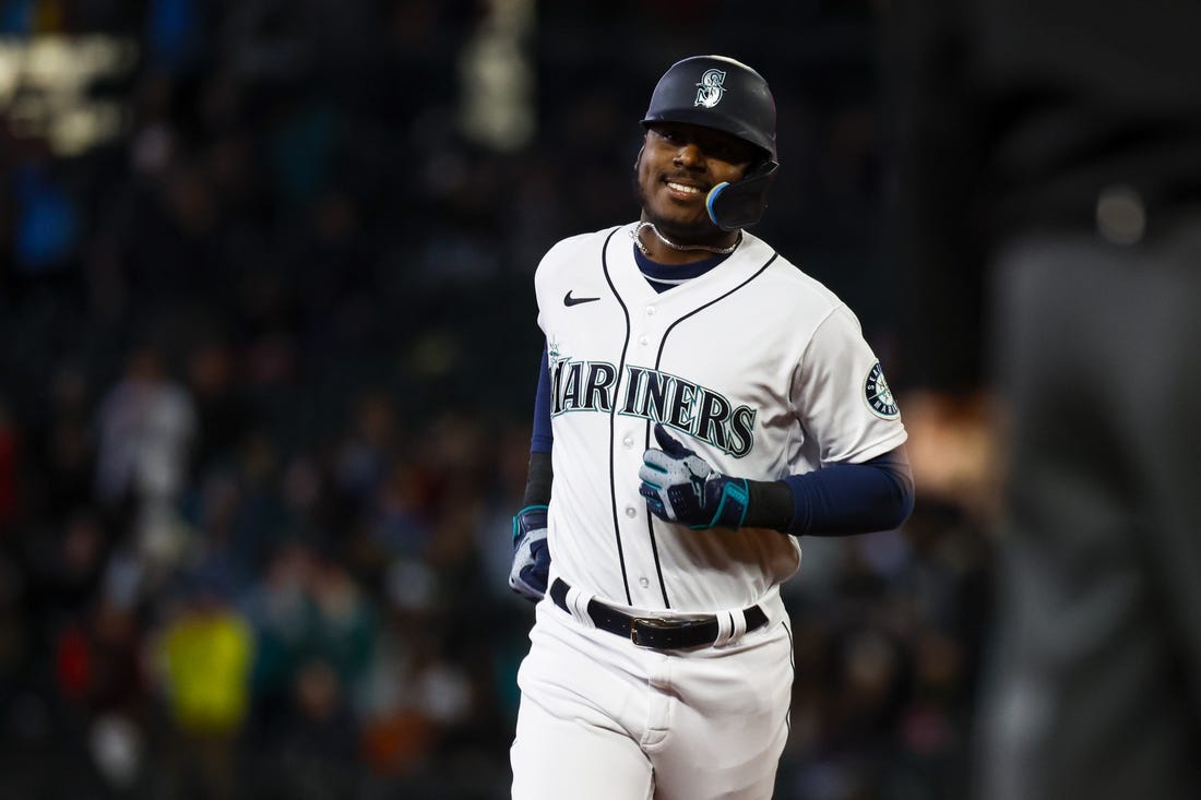 May 28, 2022; Seattle, Washington, USA; Seattle Mariners designated hitter Kyle Lewis (1) runs the bases after hitting a solo home run against the Houston Astros during the second inning at T-Mobile Park. Mandatory Credit: Joe Nicholson-USA TODAY Sports