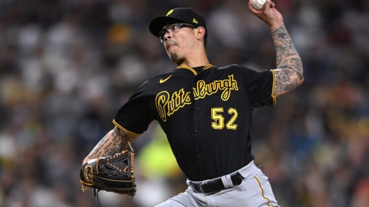 May 28, 2022; San Diego, California, USA; Pittsburgh Pirates relief pitcher Anthony Banda (52) throws a pitch against the San Diego Padres during the eighth inning at Petco Park. Mandatory Credit: Orlando Ramirez-USA TODAY Sports