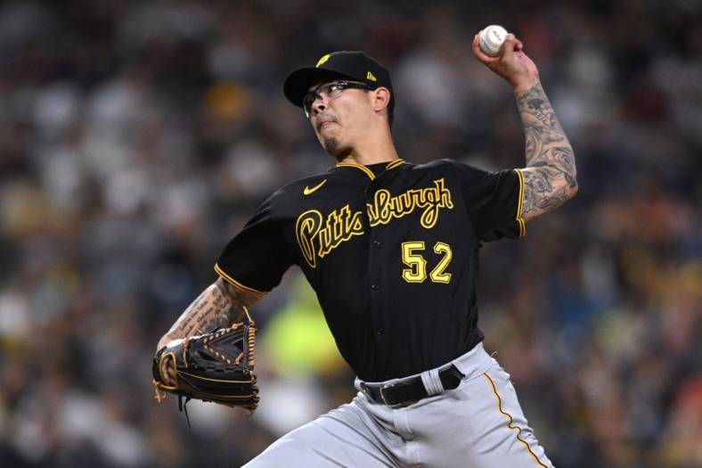 May 28, 2022; San Diego, California, USA; Pittsburgh Pirates relief pitcher Anthony Banda (52) throws a pitch against the San Diego Padres during the eighth inning at Petco Park. Mandatory Credit: Orlando Ramirez-USA TODAY Sports