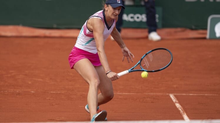 May 30, 2022; Paris, France; Irina-Camelia Begu (ROU) returns a shot in her match against Jessica Pegula (USA) on day nine of the French Open at Stade Roland-Garros. Mandatory Credit: Susan Mullane-USA TODAY Sports
