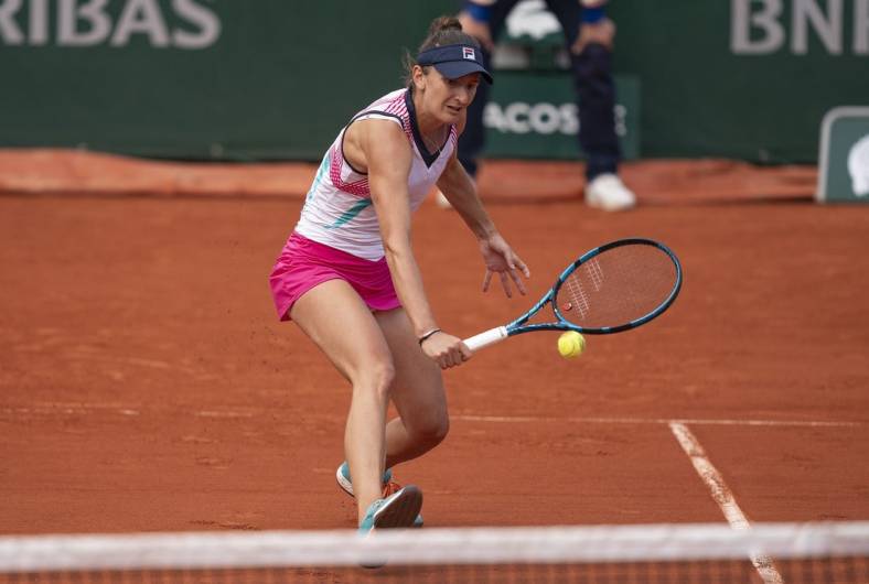 May 30, 2022; Paris, France; Irina-Camelia Begu (ROU) returns a shot in her match against Jessica Pegula (USA) on day nine of the French Open at Stade Roland-Garros. Mandatory Credit: Susan Mullane-USA TODAY Sports