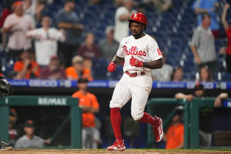 May 31, 2022; Philadelphia, Pennsylvania, USA; Philadelphia Phillies center fielder Roman Quinn (24) scores a run on a single by third baseman Alec Bohm (28) (not pictured) during the eleventh inning against the San Francisco Giants at Citizens Bank Park. Mandatory Credit: Gregory Fisher-USA TODAY Sports
