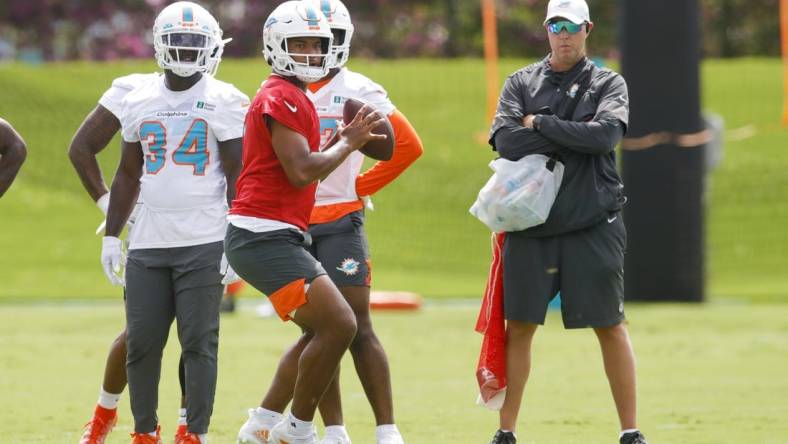 Jun 2, 2022; Miami Gardens, Florida, USA; Miami Dolphins quarterback Tua Tagovailoa (1) throws the football during minicamp at Baptist Health Training Complex. Mandatory Credit: Sam Navarro-USA TODAY Sports