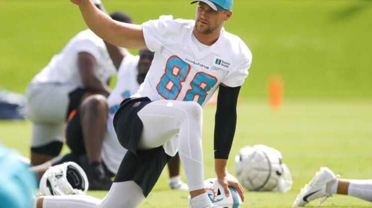 Jun 2, 2022; Miami Gardens, Florida, USA; Miami Dolphins tight end Mike Gesicki (88) works out during minicamp at Baptist Health Training Complex. Mandatory Credit: Sam Navarro-USA TODAY Sports
