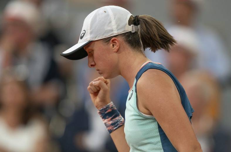 June 4, 2022; Paris, France; Iga Swiatek (POL) reacts to a point during the women s singles final against Coco Gauff (USA) on day 14 of the French Open at Stade Roland-Garros. Mandatory Credit: Susan Mullane-USA TODAY Sports