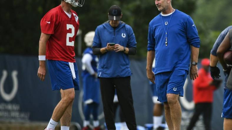 Jun 7, 2022; Indianapolis, Indiana, USA; Indianapolis Colts head coach Frank Reich talks with Indianapolis Colts quarterback Matt Ryan (2) during minicamp at the Colts practice facility. Mandatory Credit: Robert Goddin-USA TODAY Sports