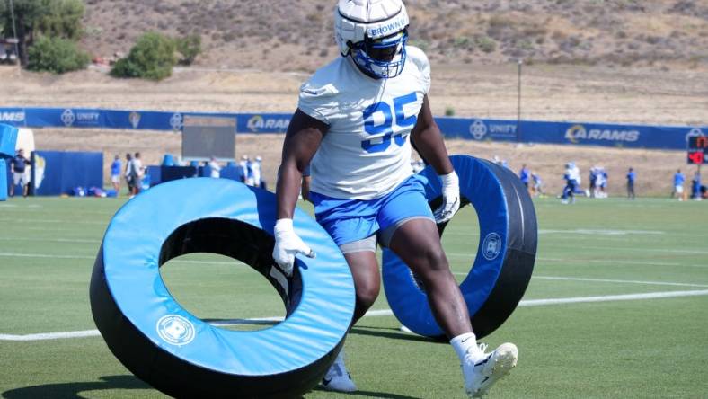 Jun 7, 2022; Thousand Oaks California, USA; Los Angeles Rams defensive tackle Bobby Brown III (95) participates in drills during minicamp at Cal Lutheran University. Mandatory Credit: Kirby Lee-USA TODAY Sports