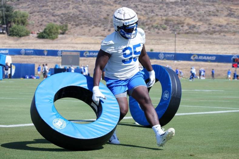 Jun 7, 2022; Thousand Oaks California, USA; Los Angeles Rams defensive tackle Bobby Brown III (95) participates in drills during minicamp at Cal Lutheran University. Mandatory Credit: Kirby Lee-USA TODAY Sports