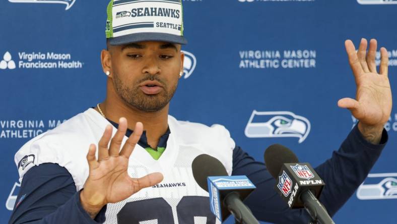 Jun 7, 2022; Renton, Washington, USA; Seattle Seahawks strong safety Jamal Adams (33) talks about past finger injuries during a press conference following a minicamp practice at the Virginia Mason Athletic Center Field. Mandatory Credit: Joe Nicholson-USA TODAY Sports