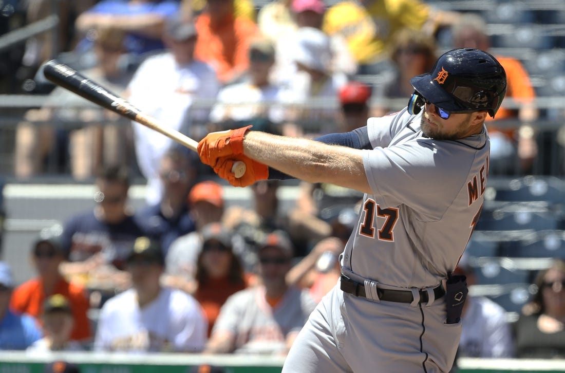 Jun 8, 2022; Pittsburgh, Pennsylvania, USA;  Detroit Tigers right fielder Austin Meadows (17) hits a single against the Pittsburgh Pirates during the first inning at PNC Park. Mandatory Credit: Charles LeClaire-USA TODAY Sports