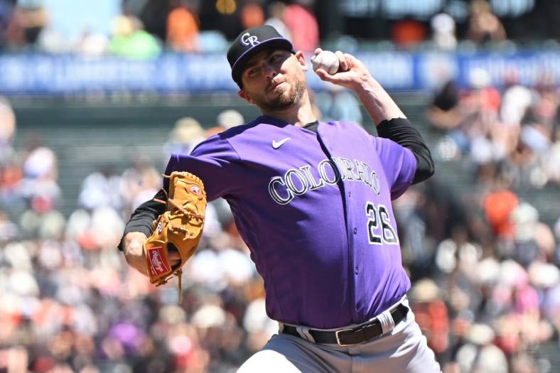 Jun 9, 2022; San Francisco, California, USA; Colorado Rockies starting pitcher Austin Gomber (26) throws a pitch against the San Francisco Giants during the first inning at Oracle Park. Mandatory Credit: Robert Edwards-USA TODAY Sports