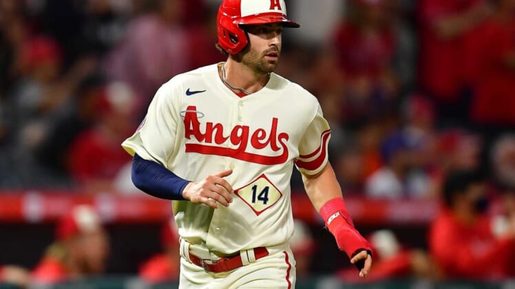 Jun 11, 2022; Anaheim, California, USA; Los Angeles Angels shortstop Tyler Wade (14) scores a run against the New York Mets during the eighth inning at Angel Stadium. Mandatory Credit: Gary A. Vasquez-USA TODAY Sports