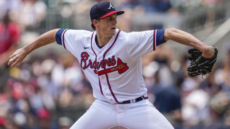 Jun 12, 2022; Cumberland, Georgia, USA; Atlanta Braves starting pitcher Kyle Wright (30) pitches against the Pittsburgh Pirates during the second inning at Truist Park. Mandatory Credit: Dale Zanine-USA TODAY Sports