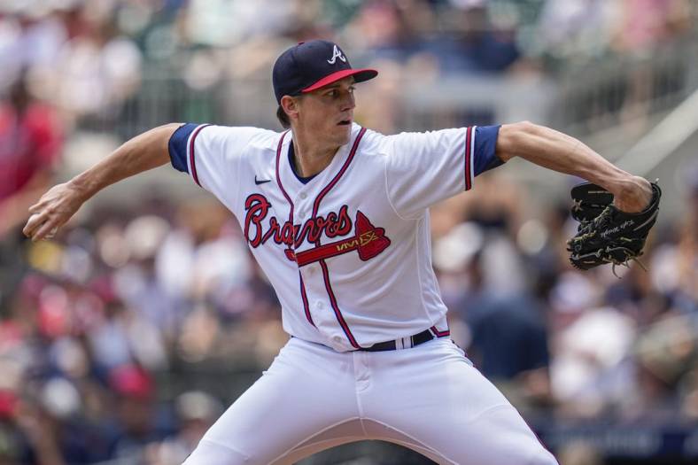 Jun 12, 2022; Cumberland, Georgia, USA; Atlanta Braves starting pitcher Kyle Wright (30) pitches against the Pittsburgh Pirates during the second inning at Truist Park. Mandatory Credit: Dale Zanine-USA TODAY Sports