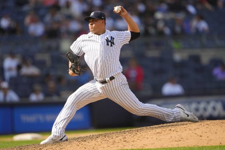 Jun 12, 2022; Bronx, New York, USA; New York Yankees pitcher Manny Banuelos (68) delivers a pitch against the Chicago Cubs during the ninth inning at Yankee Stadium. Mandatory Credit: Gregory Fisher-USA TODAY Sports