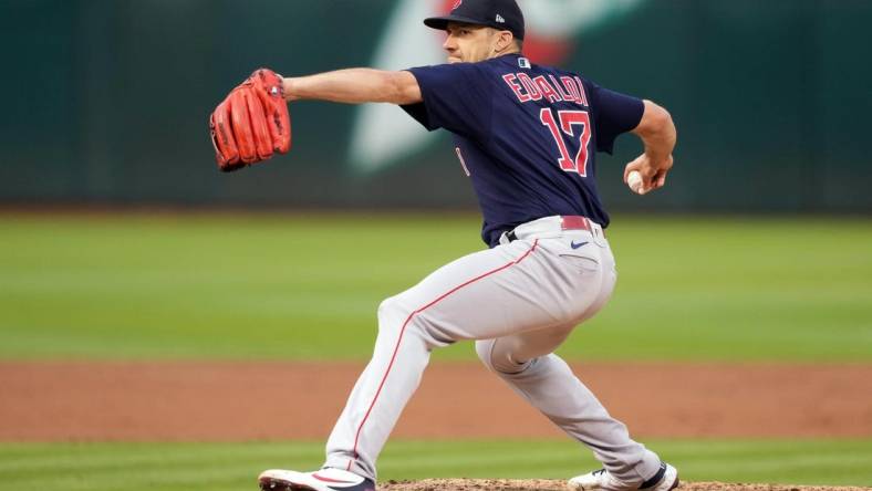 Jun 3, 2022; Oakland, California, USA; Boston Red Sox starting pitcher Nathan Eovaldi (17) throws a pitch against the Oakland Athletics during the third inning at RingCentral Coliseum. Mandatory Credit: Darren Yamashita-USA TODAY Sports