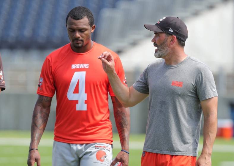 Cleveland Browns quarterback Deshaun Watson talks with head coach Kevin Stefanski after minicamp on Wednesday, June 15, 2022 in Canton, Ohio, at Tom Benson Hall of Fame Stadium.

Browns Hof 4