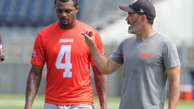 Cleveland Browns quarterback Deshaun Watson talks with head coach Kevin Stefansky after minicamp on Wednesday, June 15, 2022 in Canton, Ohio, at Tom Benson Hall of Fame Stadium.Browns Hof 4