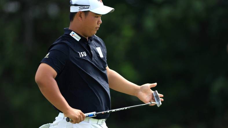 Jun 17, 2022; Brookline, Massachusetts, USA; Joohyung Kim lines up a putt during the second round of the U.S. Open golf tournament. Mandatory Credit: Aaron Doster-USA TODAY Sports