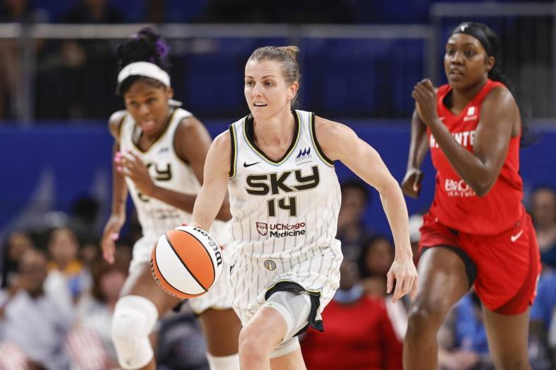 Jun 17, 2022; Chicago, Illinois, USA; Chicago Sky guard Allie Quigley (14) brings the ball up court against the Atlanta Dream during the second half of a WNBA game at Wintrust Arena. Mandatory Credit: Kamil Krzaczynski-USA TODAY Sports