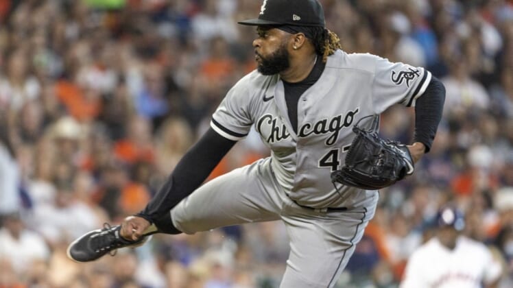 Jun 18, 2022; Houston, Texas, USA; Chicago White Sox starting pitcher Johnny Cueto (47) pitches against the Houston Astros  in the first inning at Minute Maid Park. Mandatory Credit: Thomas Shea-USA TODAY Sports
