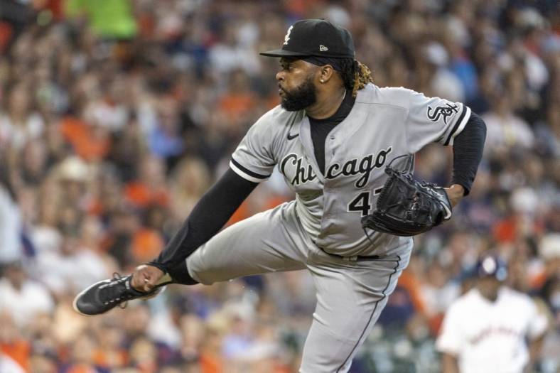 Jun 18, 2022; Houston, Texas, USA; Chicago White Sox starting pitcher Johnny Cueto (47) pitches against the Houston Astros  in the first inning at Minute Maid Park. Mandatory Credit: Thomas Shea-USA TODAY Sports