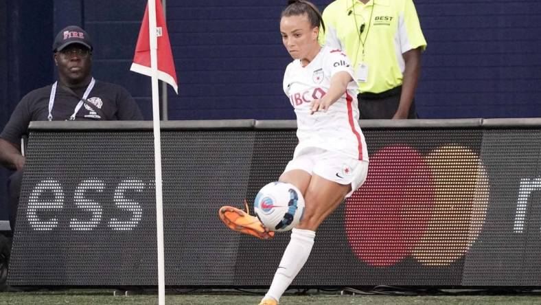 Jun 18, 2022; Kansas City, Kansas, USA;  Chicago Red Stars forward Mallory Pugh (9) kicks a corner kick during the first half against the Kansas City Current at Children's Mercy Park. Mandatory Credit: Denny Medley-USA TODAY Sports