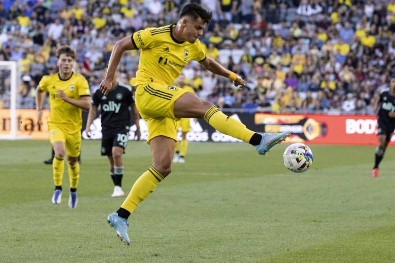 Jun 18, 2022; Columbus, Ohio, USA; Columbus Crew forward Miguel Berry (27) plays the ball out of the air against Charlotte FC in the first half at Lower.com Field. Mandatory Credit: Greg Bartram-USA TODAY Sports