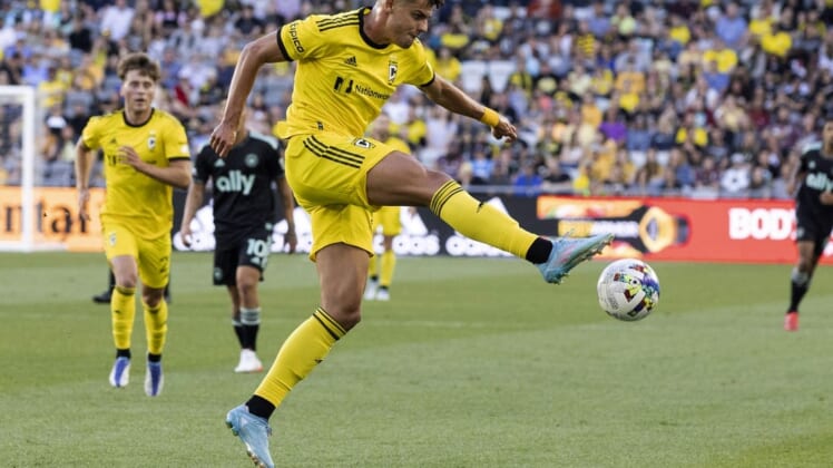 Jun 18, 2022; Columbus, Ohio, USA; Columbus Crew forward Miguel Berry (27) plays the ball out of the air against Charlotte FC in the first half at Lower.com Field. Mandatory Credit: Greg Bartram-USA TODAY Sports