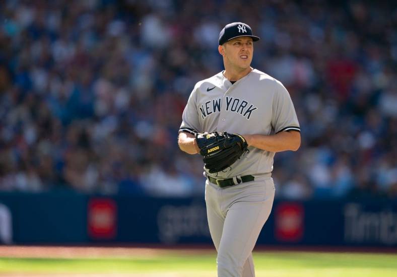 Jun 18, 2022; Toronto, Ontario, CAN; New York Yankees starting pitcher Jameson Taillon (50) walks towards the dugout after being relieved against the Toronto Blue Jays during the sixth inning at Rogers Centre. Mandatory Credit: Nick Turchiaro-USA TODAY Sports