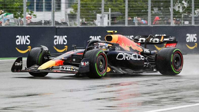 Jun 18, 2022; Montreal, Quebec, CAN; Red Bull Racing driver Sergio Perez of Mexico exits the fourteenth turn during the third free practice session at Circuit Gilles Villeneuve. Mandatory Credit: David Kirouac-USA TODAY Sports