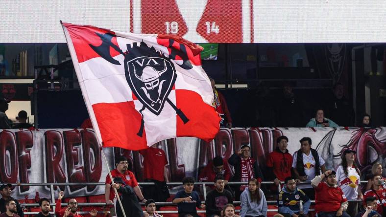 Jun 22, 2022; Harrison, NJ, United States; New York Red Bulls fans wave a flag during the first half against New York City FC at Red Bull Arena. Mandatory Credit: Vincent Carchietta-USA TODAY Sports