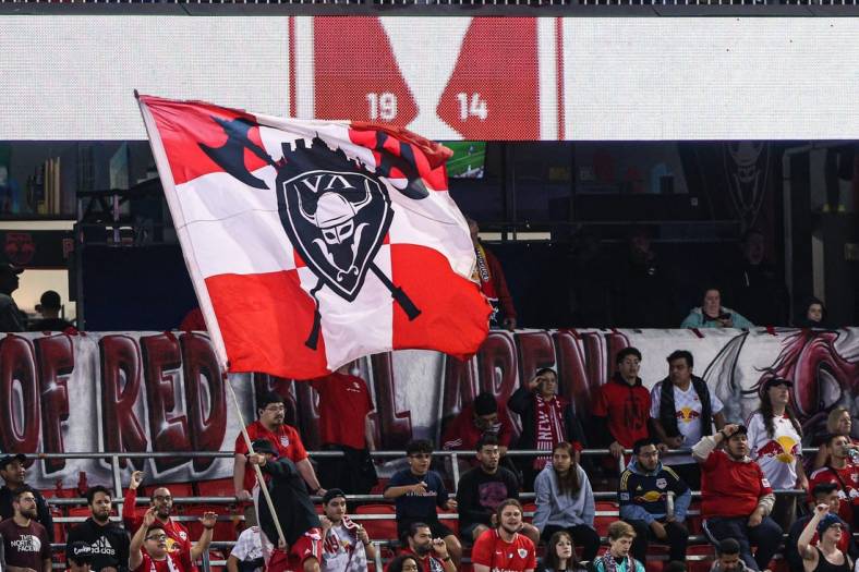 Jun 22, 2022; Harrison, NJ, United States; New York Red Bulls fans wave a flag during the first half against New York City FC at Red Bull Arena. Mandatory Credit: Vincent Carchietta-USA TODAY Sports