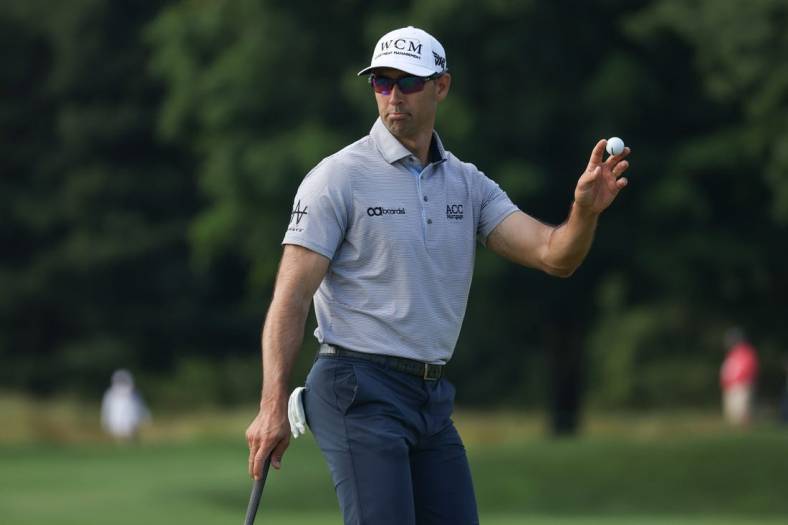 Jun 23, 2022; Cromwell, Connecticut, USA; Cameron Tringale acknowledges fans after making birdie on the on the third hole during the first round of the Travelers Championship golf tournament. Mandatory Credit: Vincent Carchietta-USA TODAY Sports