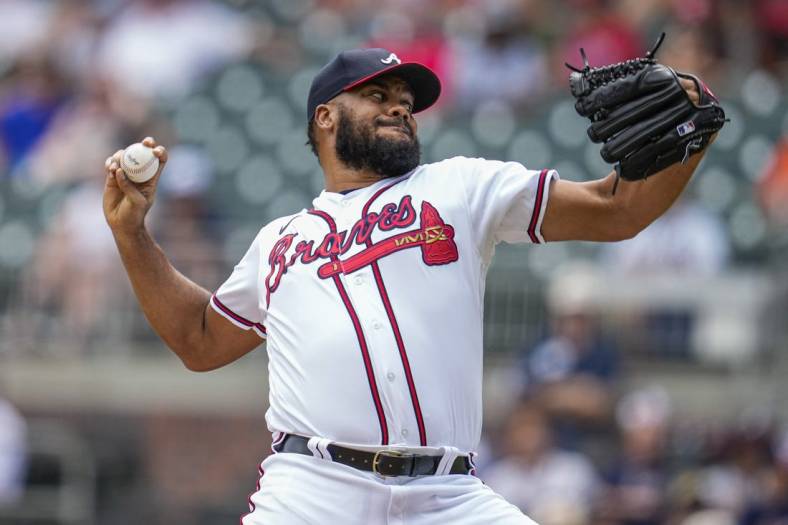 Jun 23, 2022; Cumberland, Georgia, USA; Atlanta Braves relief pitcher Kenley Jansen (74) pitches against the San Francisco Giants during the ninth inning at Truist Park. Mandatory Credit: Dale Zanine-USA TODAY Sports